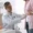 Gastroenterologist examining patient with stomach pain in clinic
