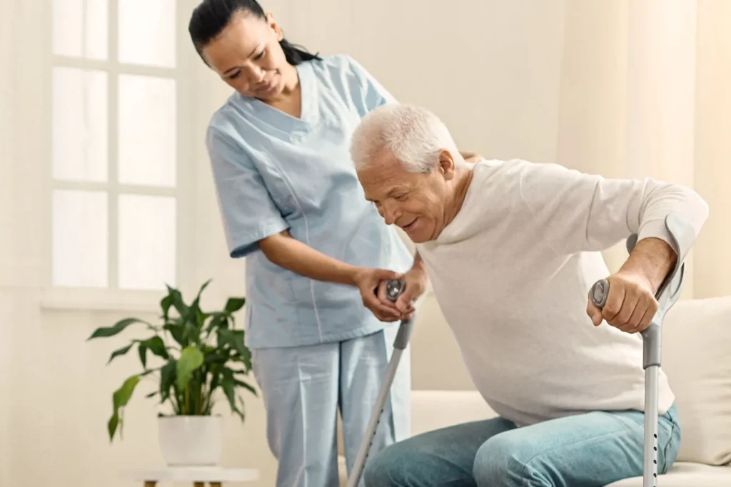 a woman helping an old man with a Chronic Care Management